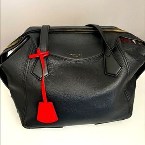 Tory Burch. Soft black leather shoulder bag. Has open pouch inside the bag.